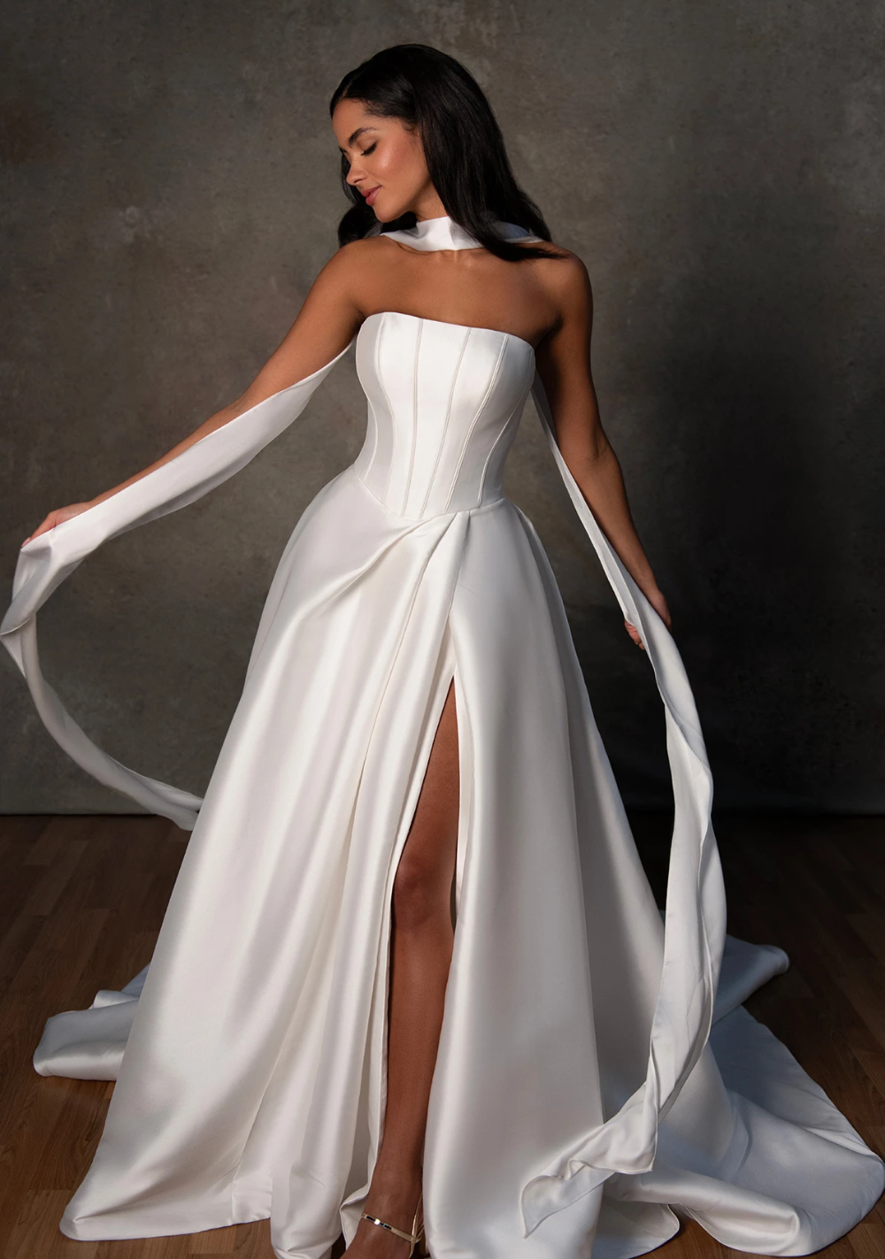 Model wearing classic simble basque waist wedding gown